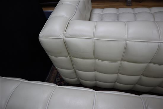 A pair of Josef Hoffmann Kubus ivory leather sofas W.150cm